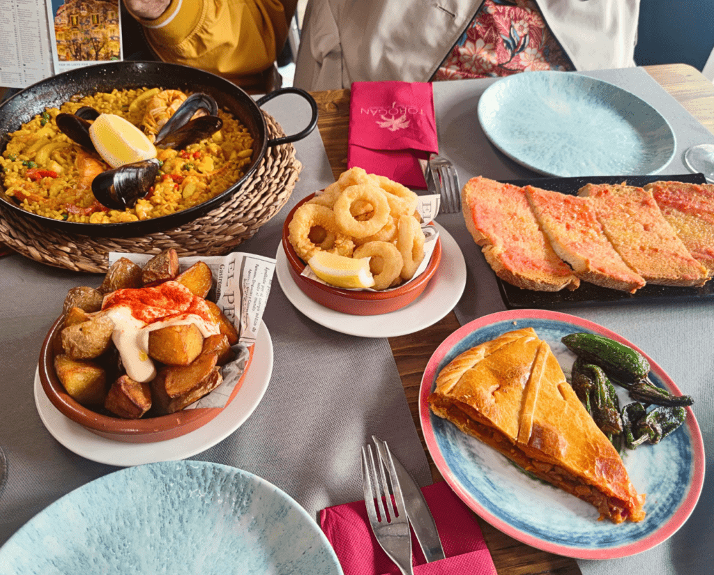 tapas, paella, table with food, Barcelona