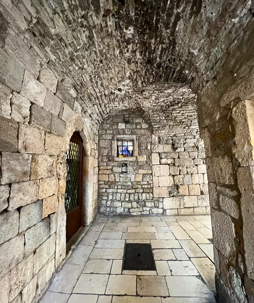 narrow street, stone walls, old town Split, Croatia