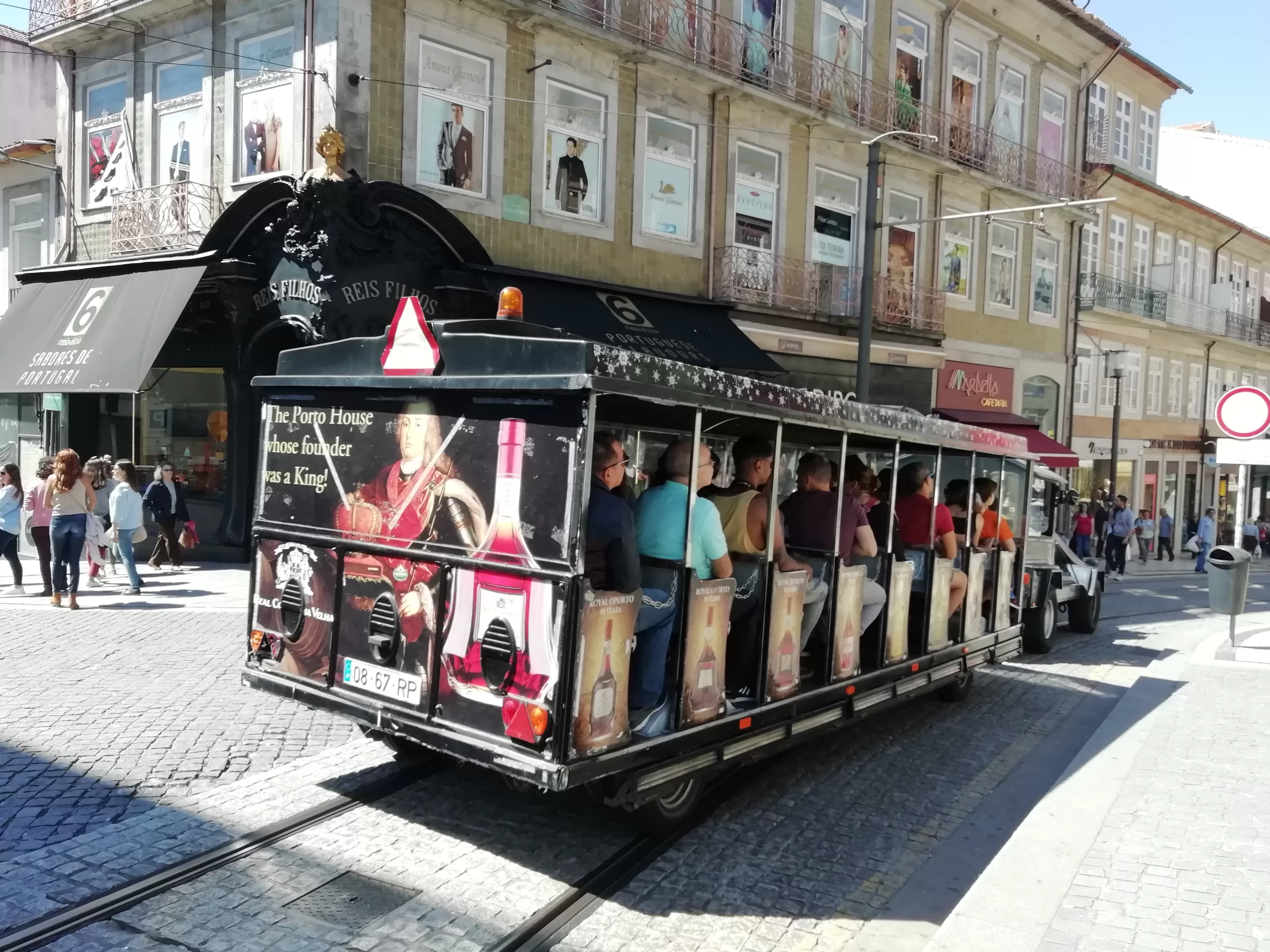 old open tram in the street of Porto